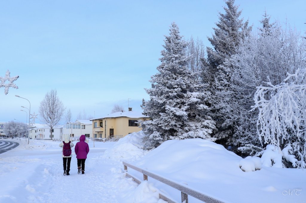 Walking along Glerárgata - street