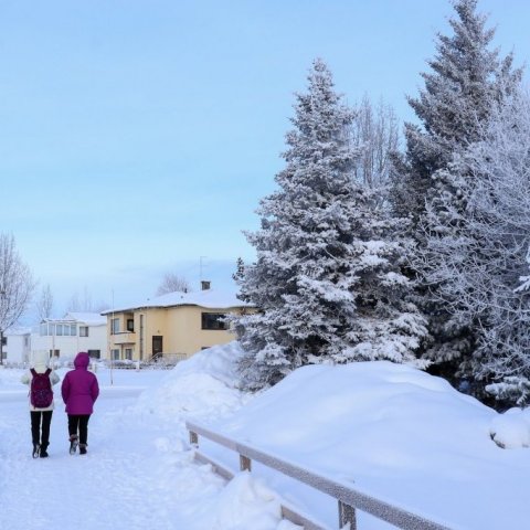 Walking along Glerárgata - street